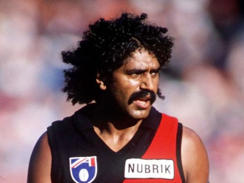 Derek Kickett of the Essendon Bombers on the field during  the 1990 AFL match at the Melbourne Cricket Ground.